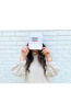 Advocate Support Empower Hat